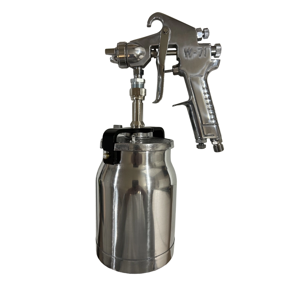 Metal spray gun with an attached canister.